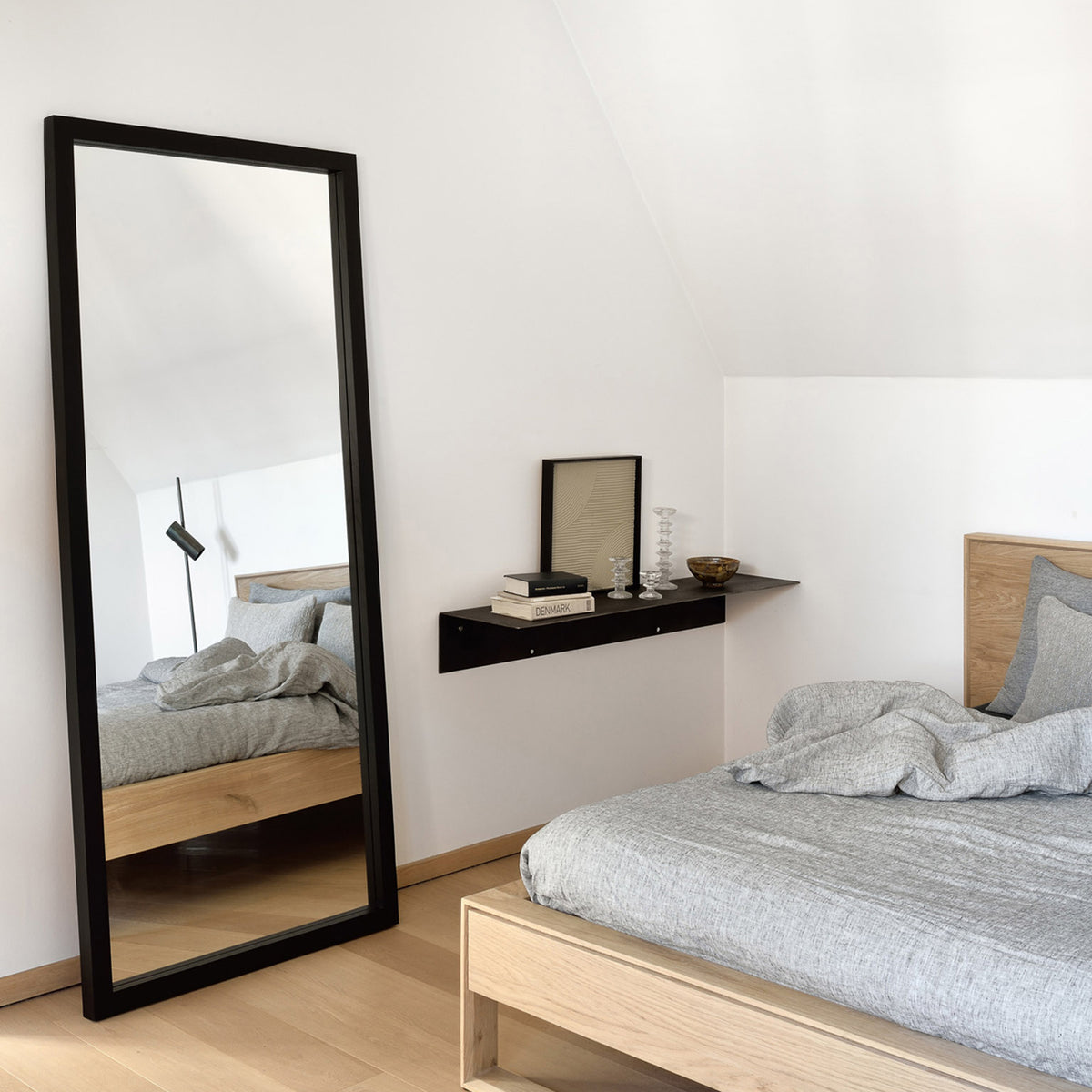 Light Frame Floor Mirror by Ethnicraft, showing oak light frame floor mirror in live shot.