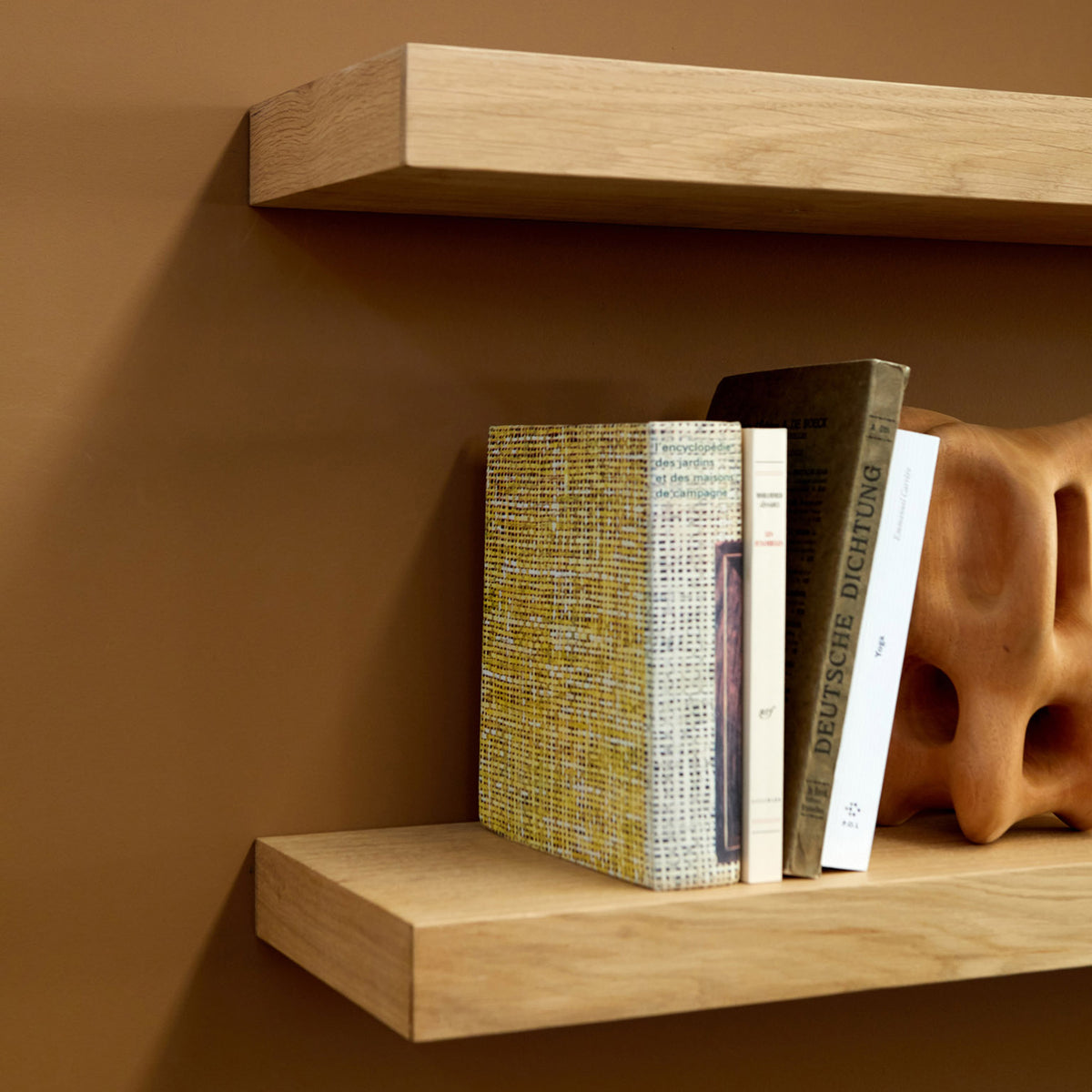 Wall Shelf by Ethnicraft, showing closeup view of oak wall shelves in live shot.