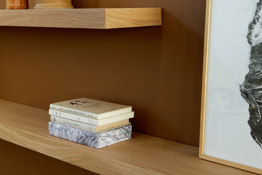 Wall Shelf by Ethnicraft, showing closeup view of oak wall shelves in live shot.