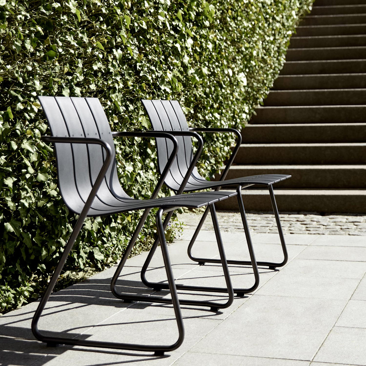 Ocean Dining Chair by Mater, showing ocean dining chairs in live shot.