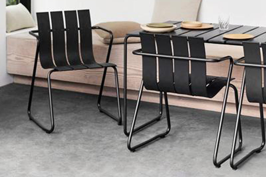 Ocean Dining Chair by Mater, showing ocean dining chairs with table in live shot.