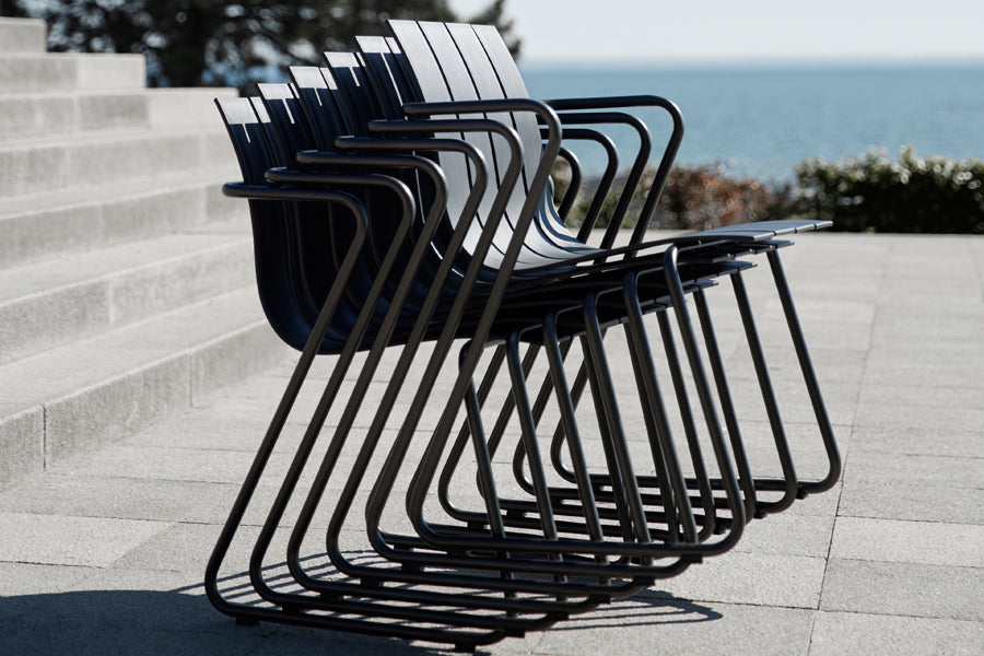 Ocean Dining Chair by Mater, showing ocean dining chairs in live shot.