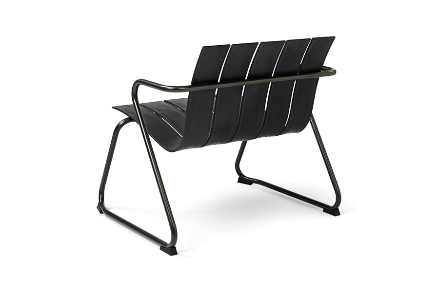 Ocean Lounge Chair by Mater, showing back view of ocean lounge chair in black plastic seat.