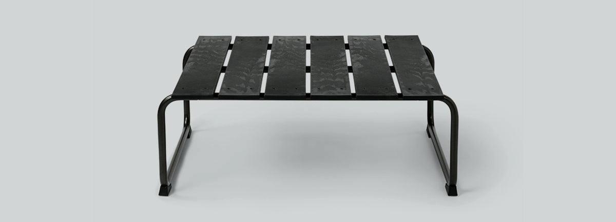 Ocean Lounge Table by Mater, showing front view of ocean lounge table in live shot.