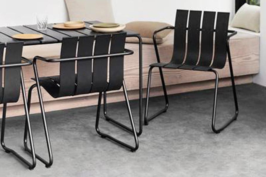 Ocean Table by Mater, showing ocean table with chairs in live shot.