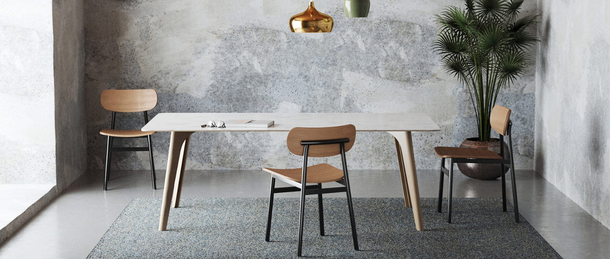 Ojai Chair by Kollektiff, showing of ojai chair with table in live shot.