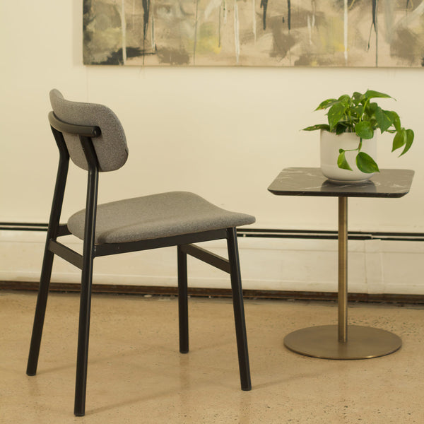 Ojai Chair by Kollektiff, showing of ojai chair with table in live shot.