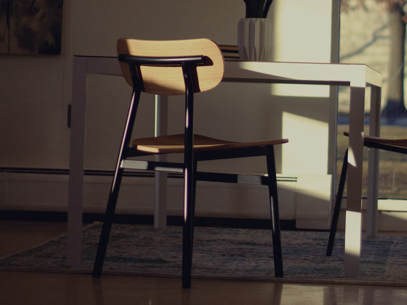 Ojai Chair by Kollektiff, showing of ojai chair with table in live shot.