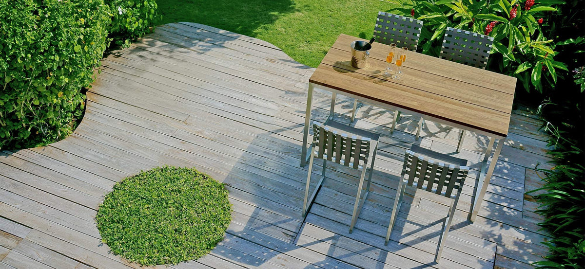 Oko Bar High Dining Table by Mamagreen, showing oko bar high dining table with high dining chairs in live shot.