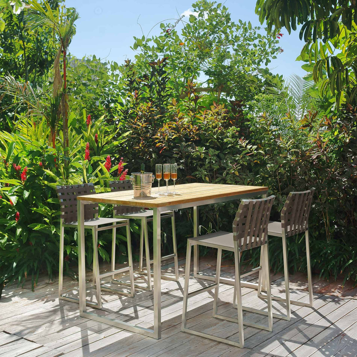 Oko Bar High Dining Table by Mamagreen, showing oko bar high dining table with high dining chairs in live shot.