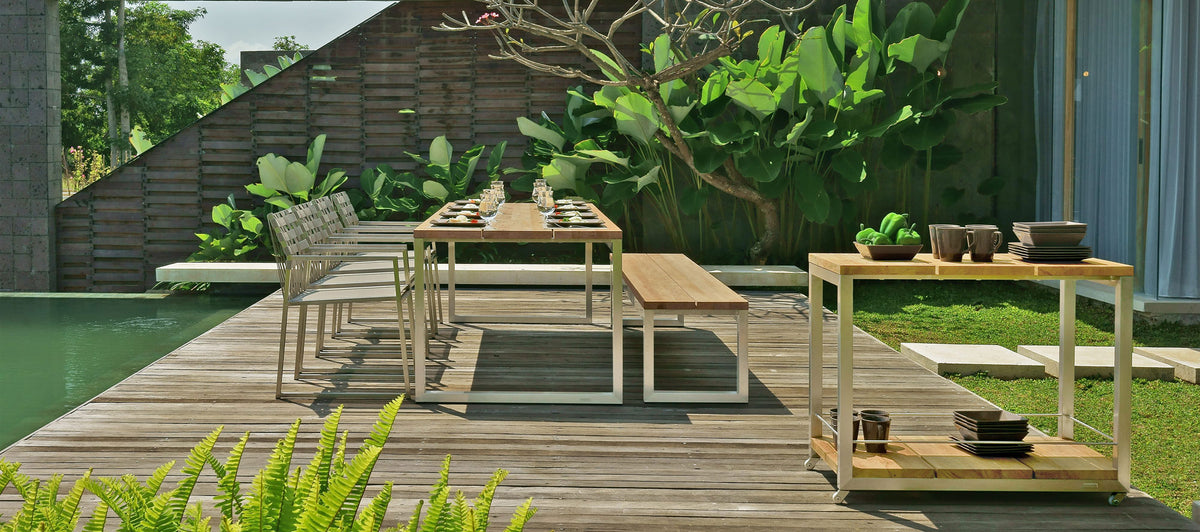Oko Dining Bench by Mamagreen, showing oko dining bench with dining table, dining chairs & trolley in live shot.