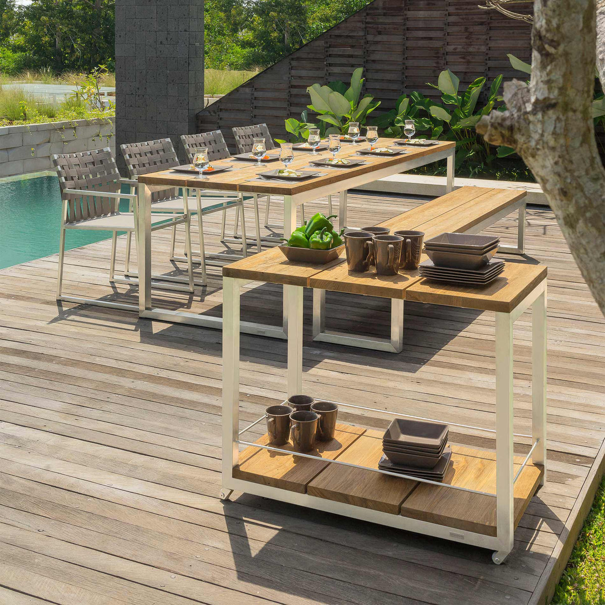 Oko Dining Bench by Mamagreen, showing oko dining bench with dining table, dining chairs & trolley in live shot.