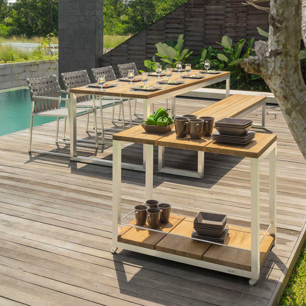 Oko Dining Table by Mamagreen, showing oko dining table with dining bench, dining chairs & trolley in live shot.