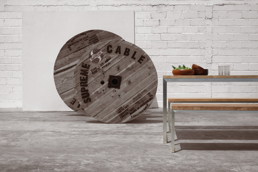 Oko Dining Table by Mamagreen, showing oko dining table with dining benches in live shot.