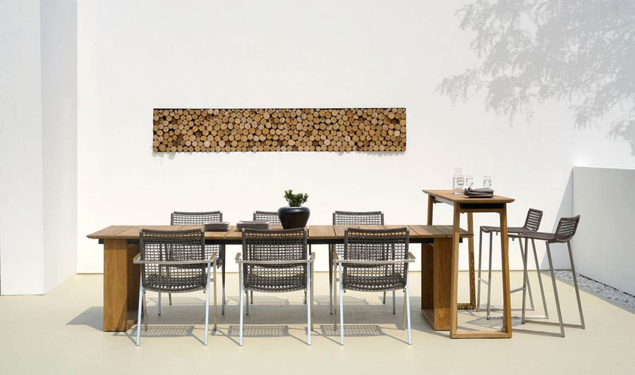 Olaf Dining Armchair by Mamagreen, showing olaf dining armchairs with dining table, bar chairs & high table in live shot.