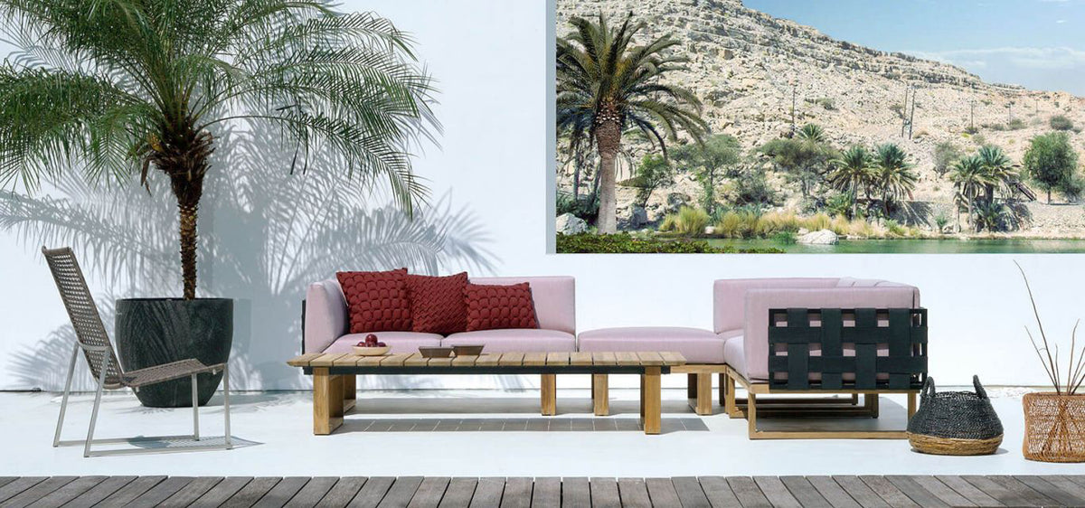 Olaf Easy Armless Chair by Mamagreen, showing olaf easy armless chair with sectional & table in live shot.