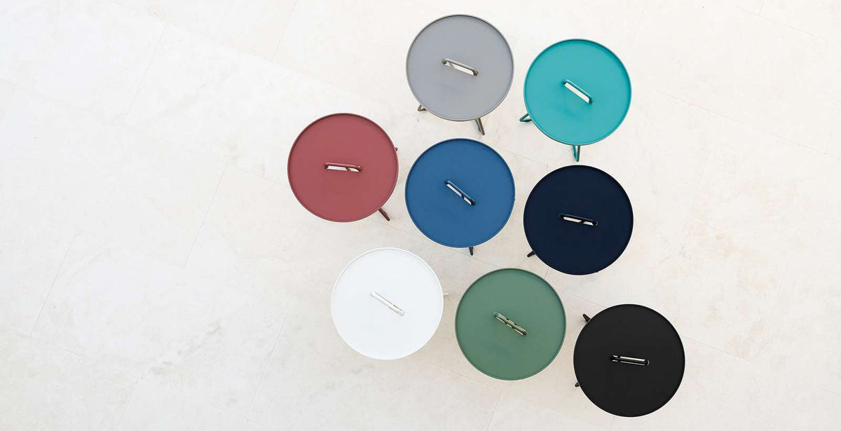 On The Move Side Table by Cane-Line, showing on the move side tables in live shot.