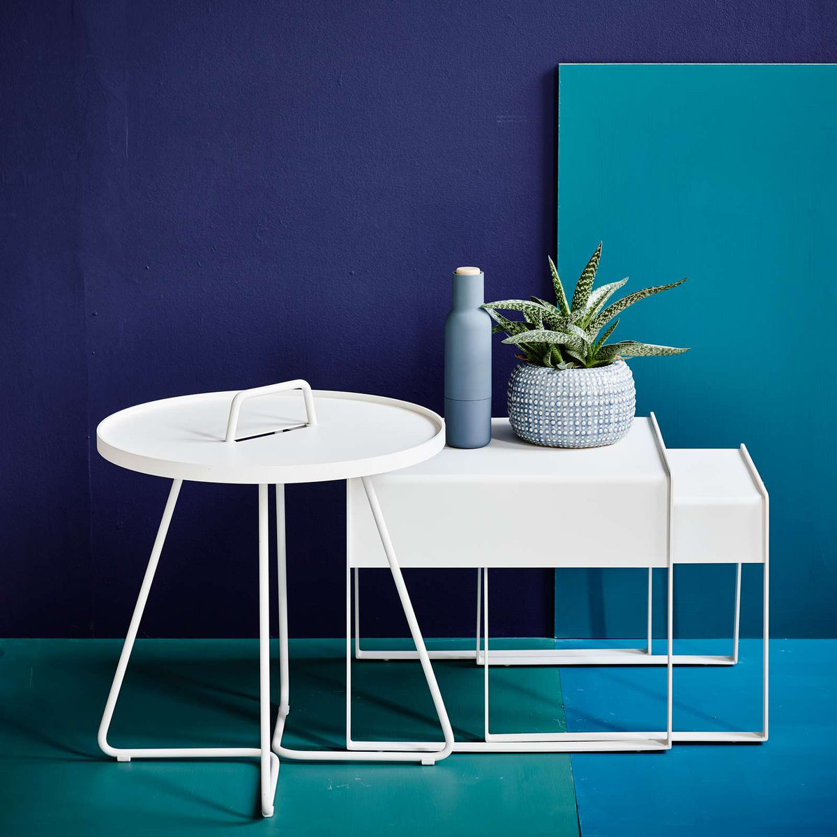 On The Move Side Table by Cane-Line, showing on the move side table in live shot.