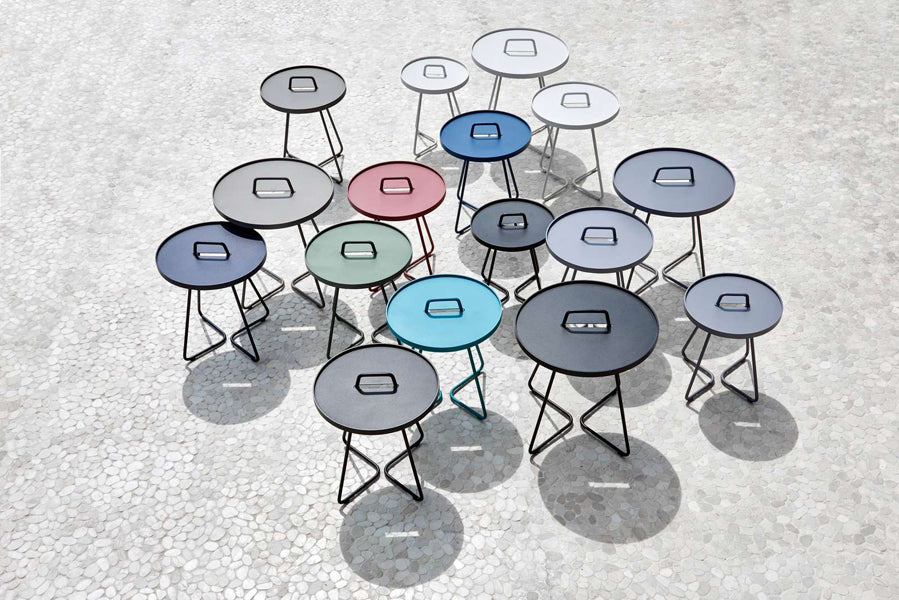 On The Move Side Table by Cane-Line, showing on the move side tables in live shot.