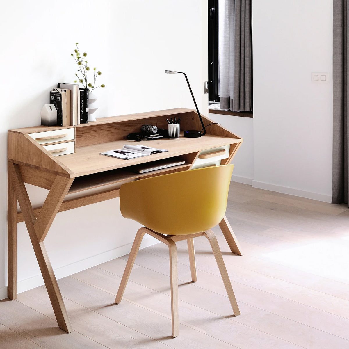 Origami Desk by Ethnicraft, showing origami desk in live shot.