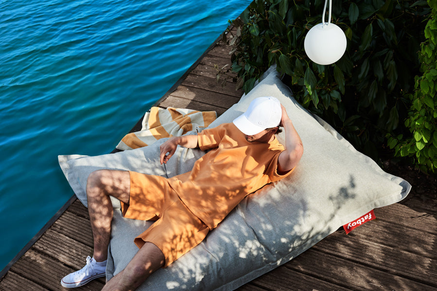 Original Slim Outdoor Bean Bag by Fatboy, showing original slim outdoor bean bag in live shot.