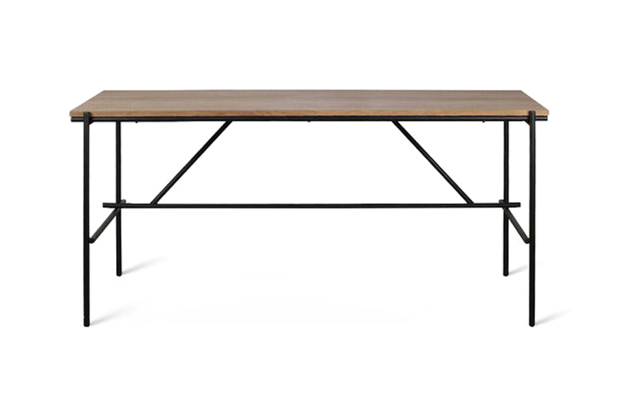 Oscar Desk by Ethnicraft, showing front view of oscar desk in teak wood/55" x 28".