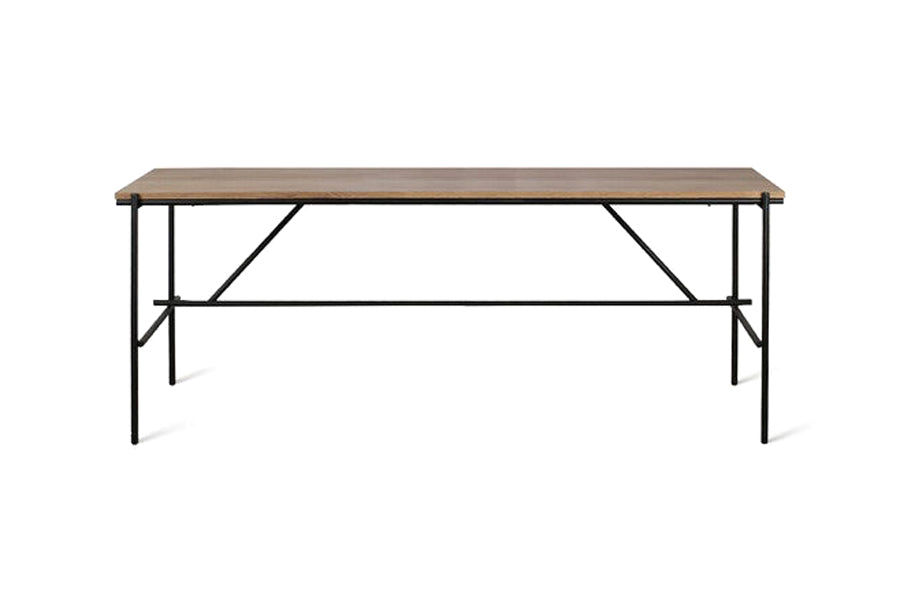 Oscar Desk by Ethnicraft, showing front view of oscar desk in teak wood/63" x 31".