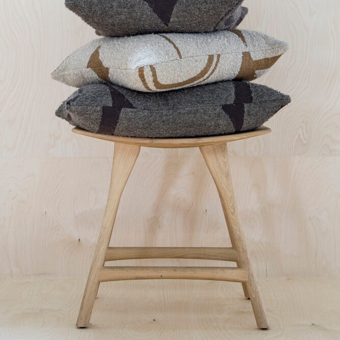 Osso Dining Stool by Ethnicraft, showing osso dining stool in live shot.