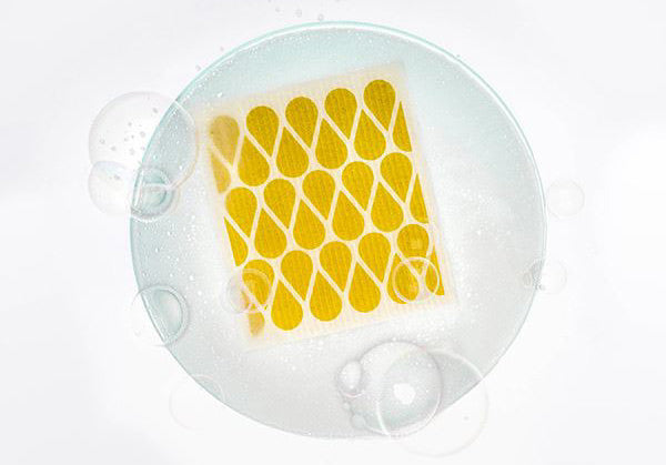 Otis Dish Cloth by Pappelina, showing top view of otis mustard dish cloth.