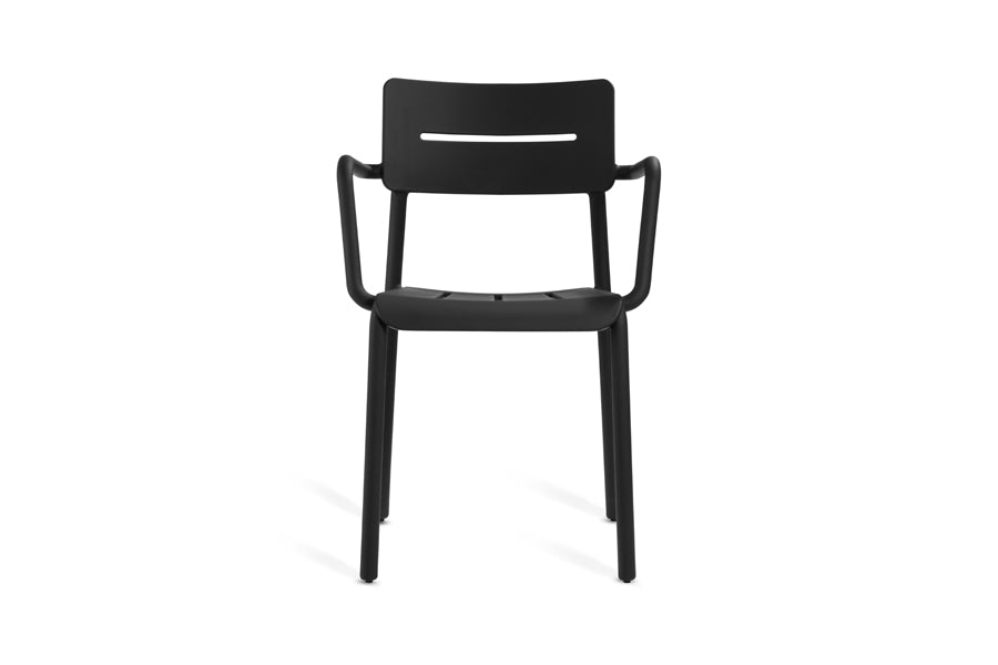 Outo Arm Chair by Toou, showing front view of outo lounge chair in black polypropylene finish/no connector table.