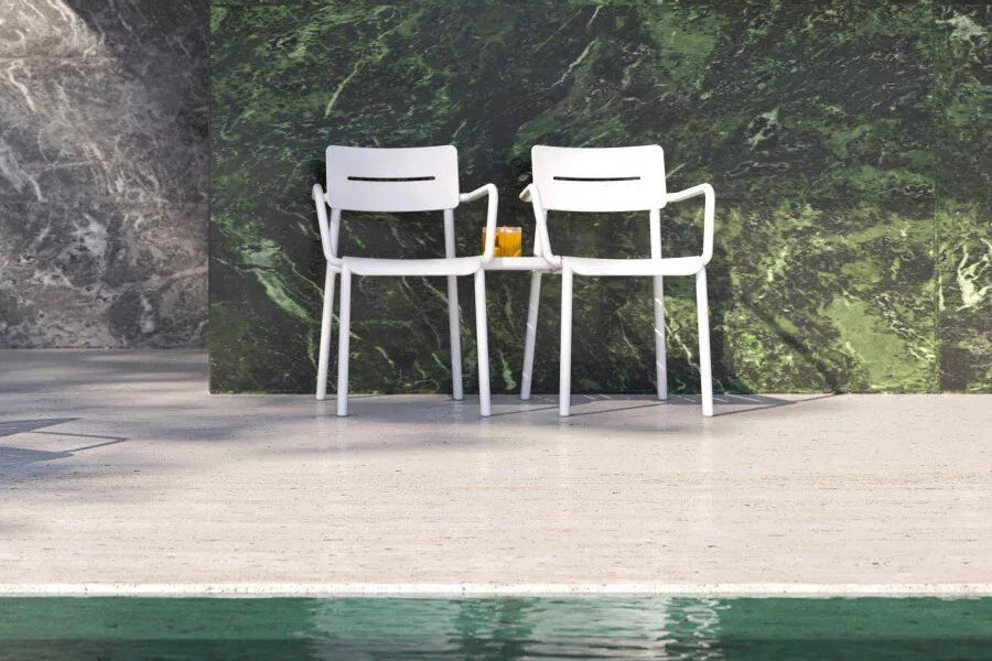 Outo Arm Chair by Toou, showing outo lounge chairs with connector table in live shot.