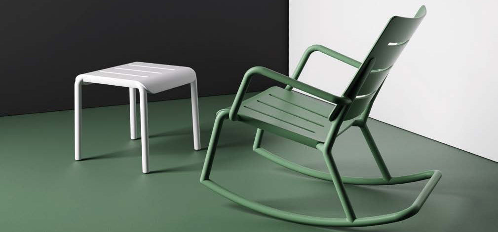 Outo Hocker Side Table by Toou, showing outo hocker side table with chair in live shot.