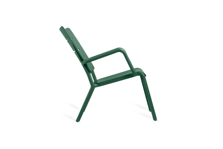 Outo Lounge Chair by Toou, showing side view of outo lounge chair in dark green.