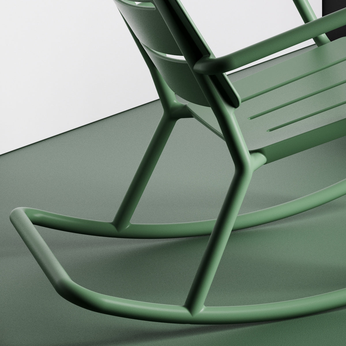 Outo Rocking Chair by Toou, showing closeup view of outo rocking chair in live shot.