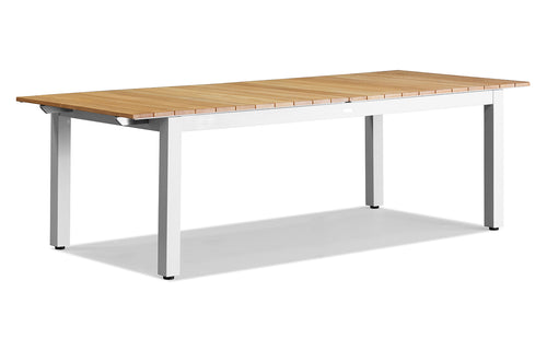 Pacific Extendable Aluminum Dining Table by Harbour - White Aluminum + Natural Teak Wood.
