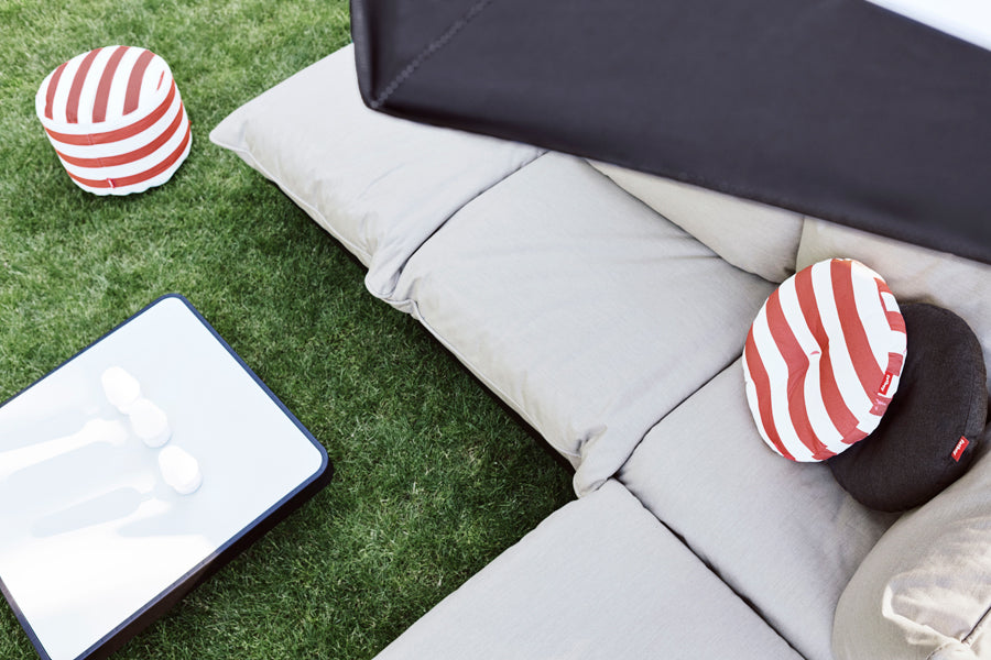Paletti Outdoor Coffee Table by Fatboy, showing paletti outdoor coffee table in live shot.