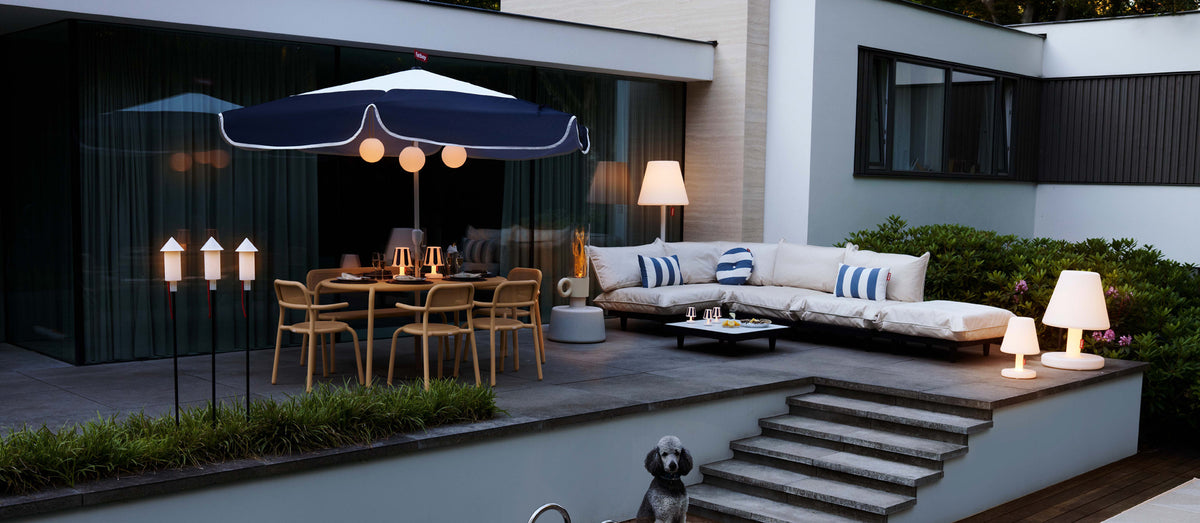 Paletti Outdoor Coffee Table by Fatboy, showing paletti outdoor coffee table in live shot.