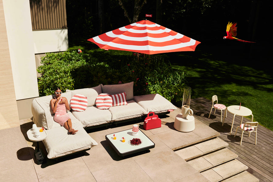 Paletti Outdoor Coffee Table by Fatboy, showing paletti outdoor coffee table in live shot.