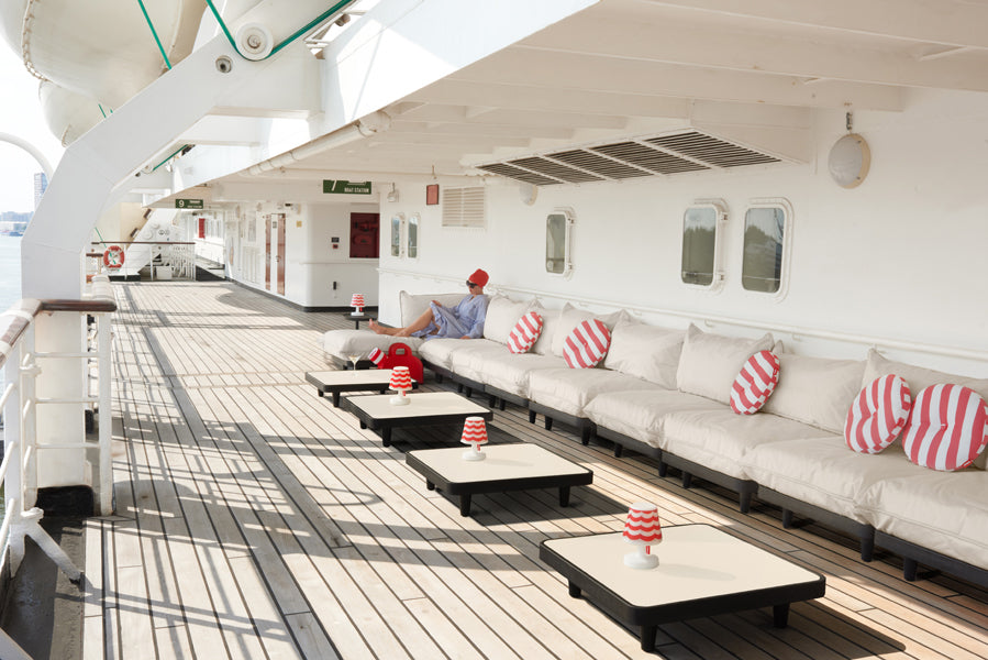 Paletti Outdoor Coffee Table by Fatboy, showing paletti outdoor coffee tables in live shot.