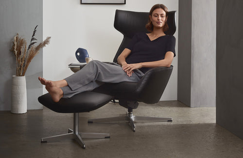 Palma Recliner Chair with Footrest + Adjustable Headrest by Kebe, showing closeup view of palma recliner chair with footrest + adjustable headrest in live shot.