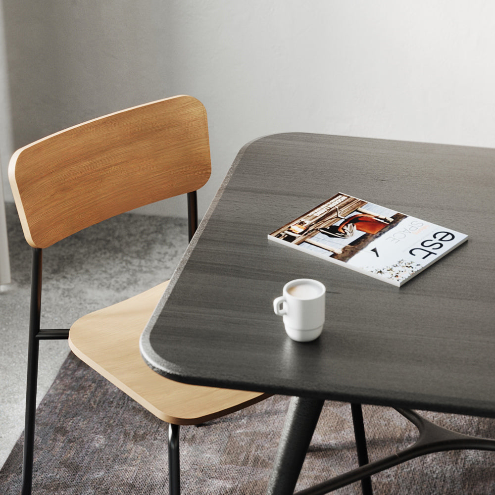 Paloma Dining Chair by Kollektiff, showing paloma dining chair with table in live shot.
