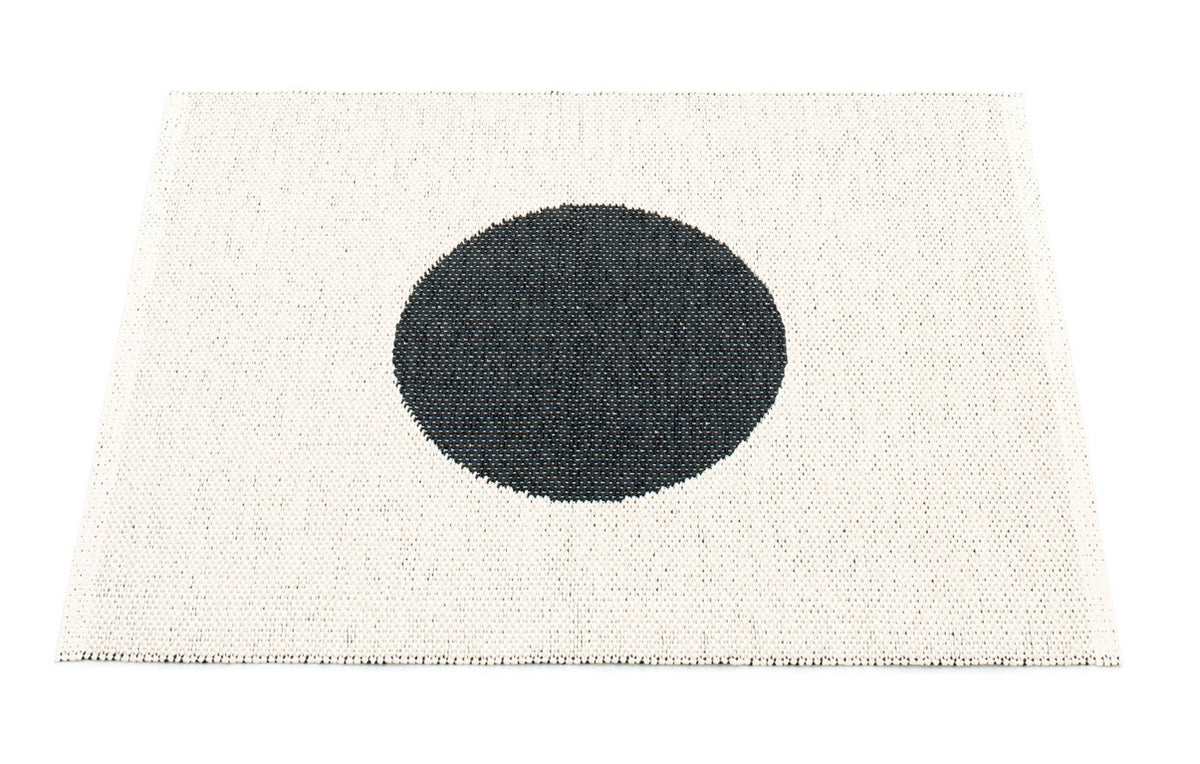 Vera Small One Rug by Pappelina, showing back view of vera small one black vanilla rug.