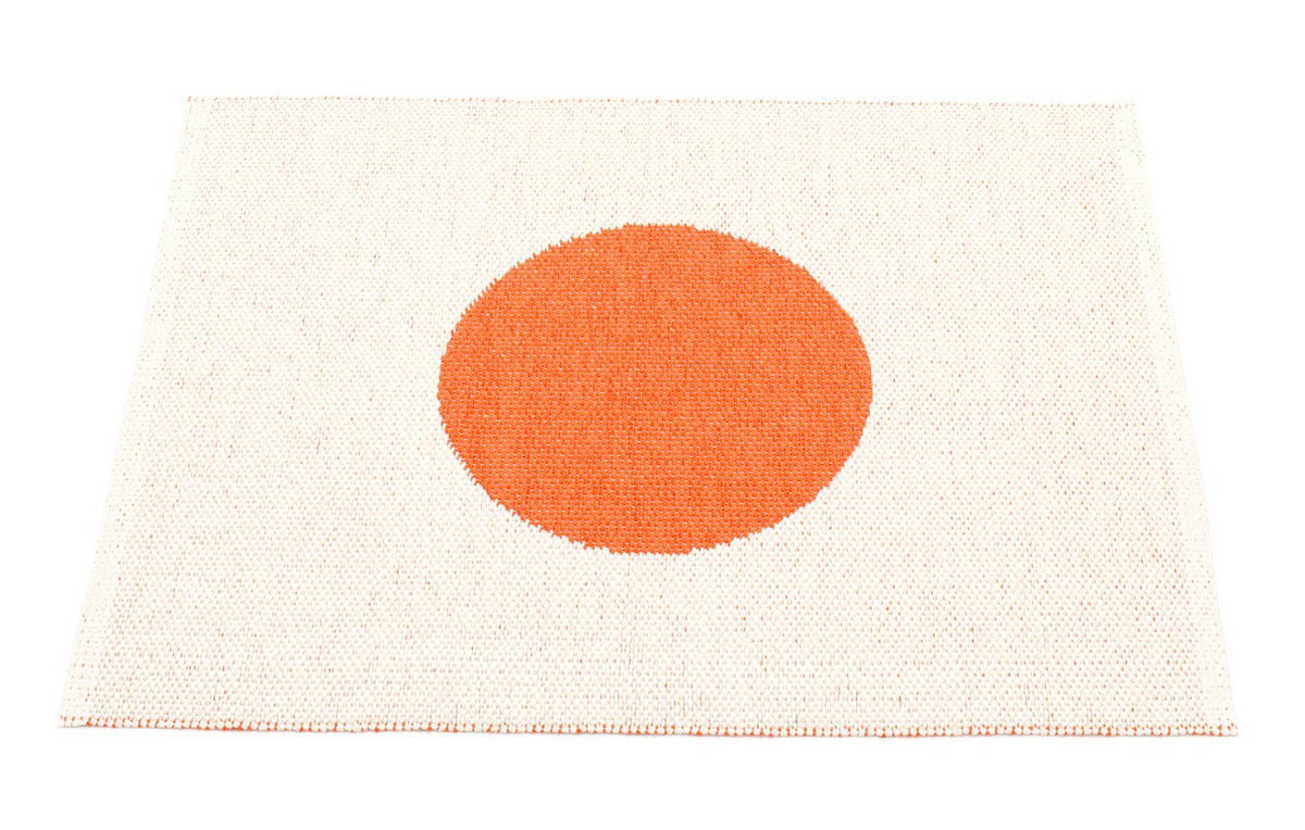 Vera Small One Rug by Pappelina, showing back view of vera small one orange & vanilla rug.