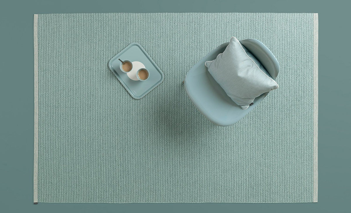 Vera Tray by Pappelina, showing top view of vera turquoise tray with rug.