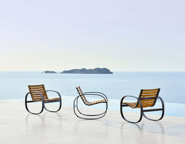 Parc Rocking Chair by Cane-Line, showing parc rocking chairs in live shot.