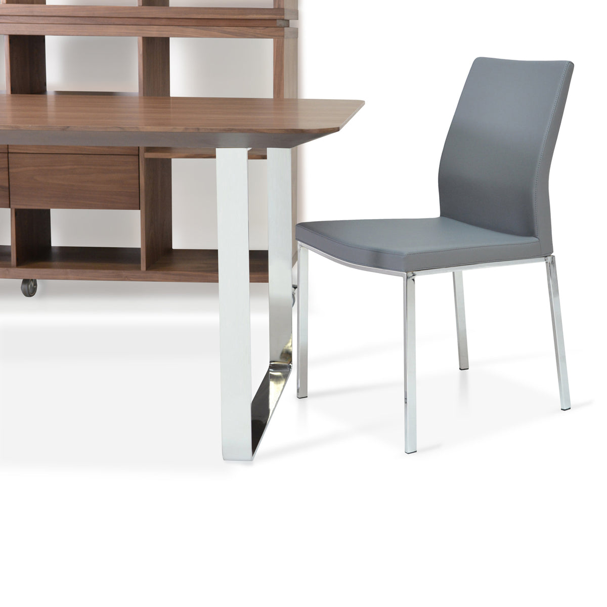 Pasha Metal Dining Chair by SohoConcept, showing metal dining chair with table.