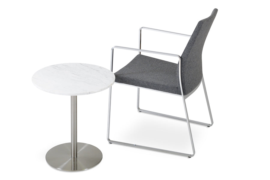 Pasha Arm Sled Dining Chair by SohoConcept, showing slide dining arm chair with table.