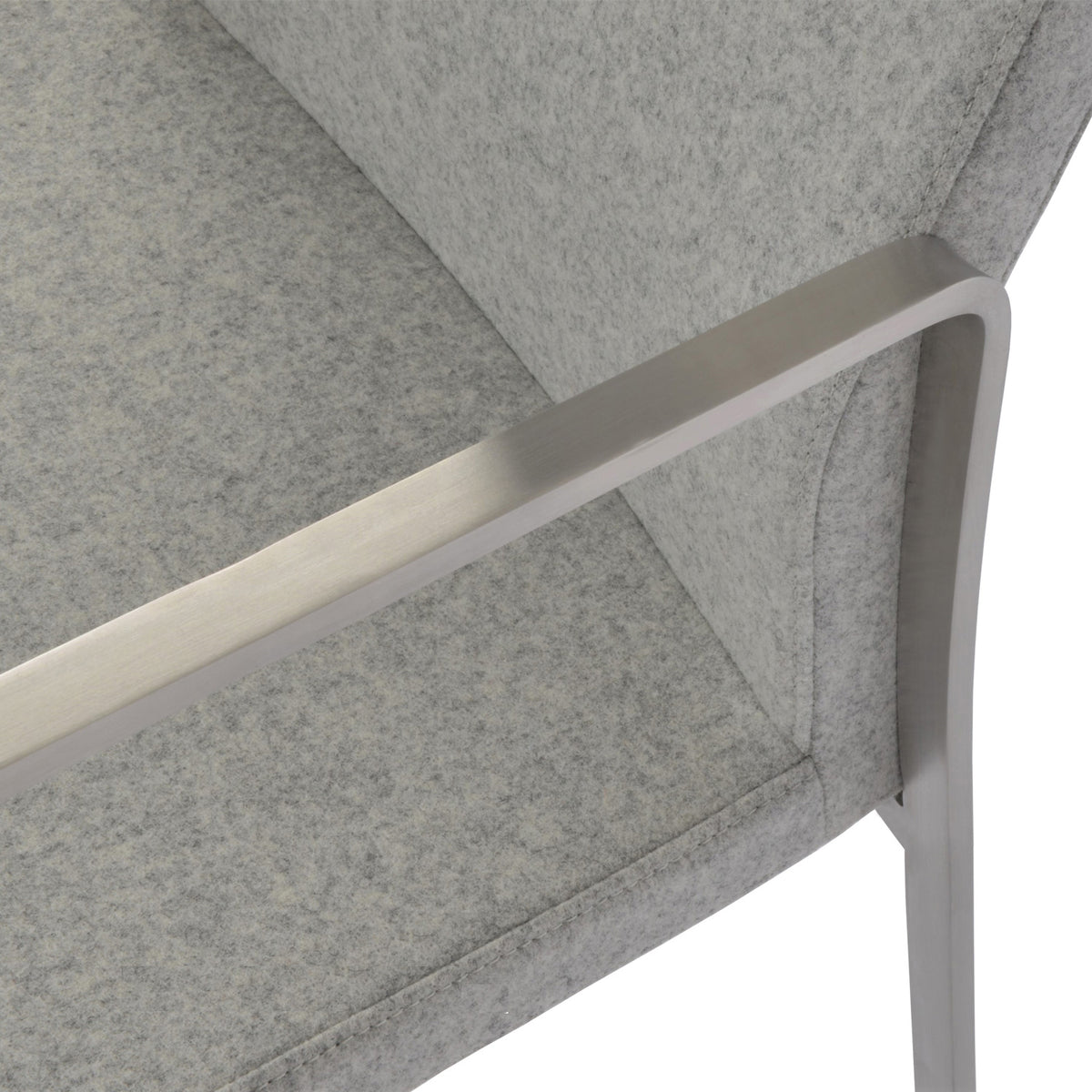 Pasha Arm Sled Dining Chair by SohoConcept, showing closeup view of slide dining arm chair.