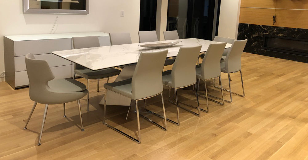 Pasha Sled Dining Chair by SohoConcept, showing back view of sled dining chairs with table in live shot.