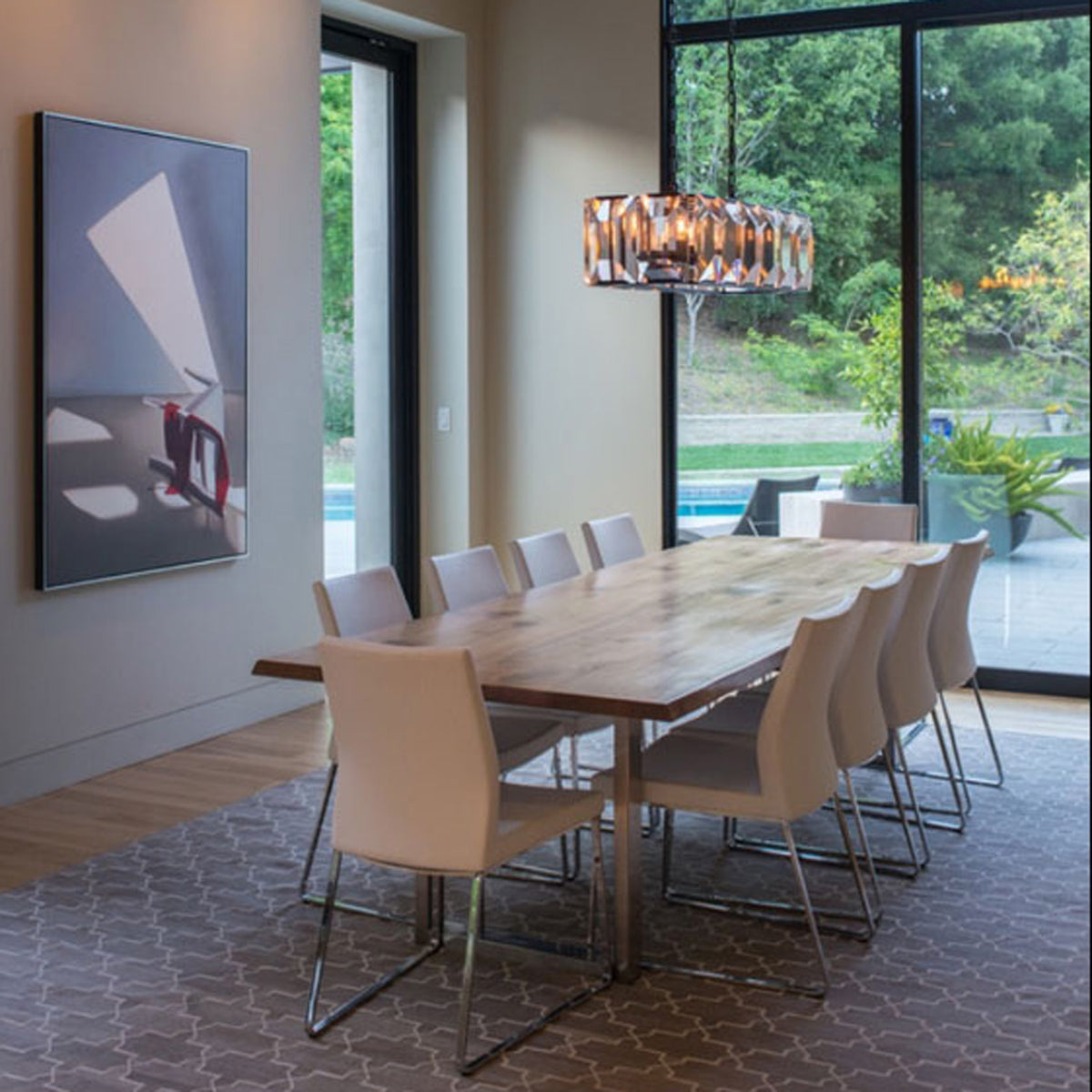 Pasha Sled Dining Chair by SohoConcept, showing sled dining chairs in live shot.